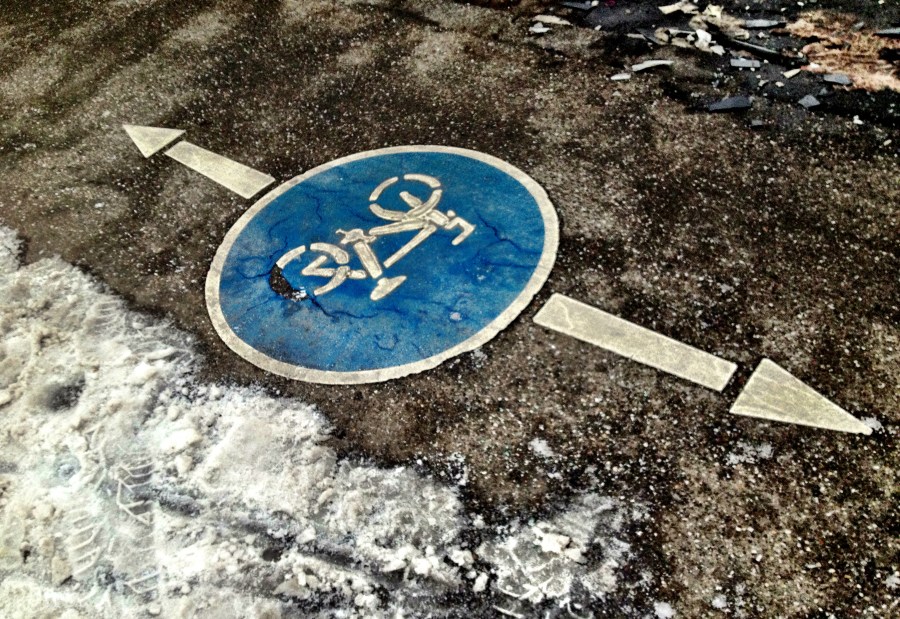 While ice & snow lingered on the bike lanes, cyclists proceeded as normal