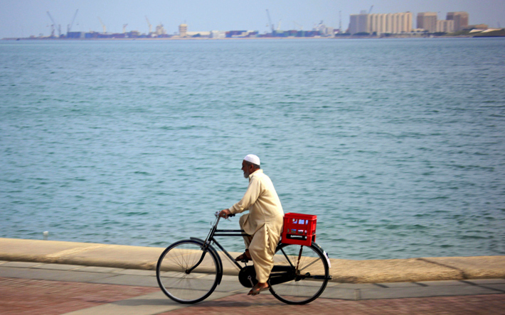 Cyclist spotted, along the Corniche (photo credit: Kate Harris, IISD Earth Negotiations Bulletin)