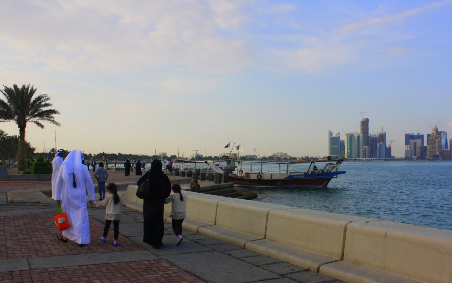 Familes stroll along the Corniche Bay on a long & wide pedestrian cooridor