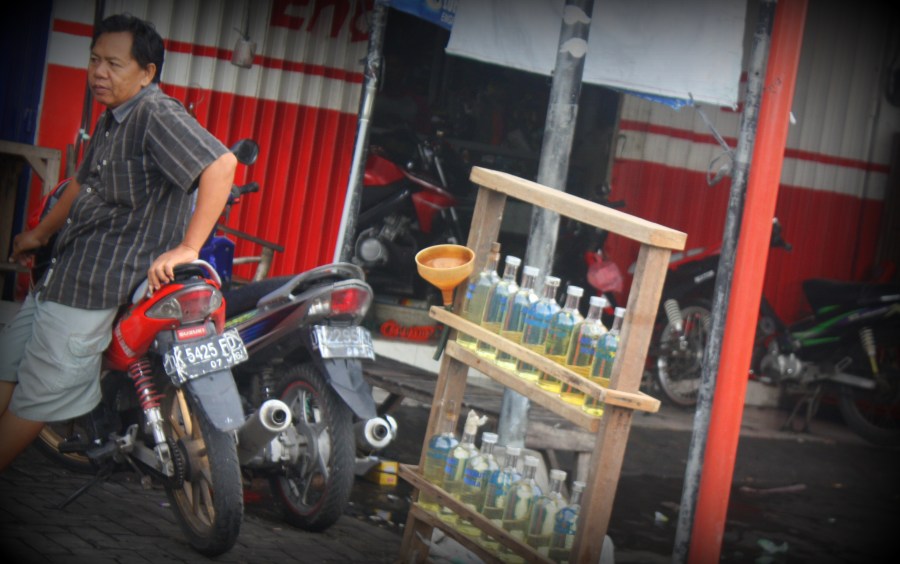 Petrol is cheap, and sold in small quantities, all over the island