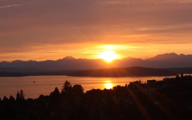 Bliss: sitting on my parents' balcony in West Seattle, staring off at the Olympics and Puget Sound on a warm summer's night. Seattle rain? Not here!