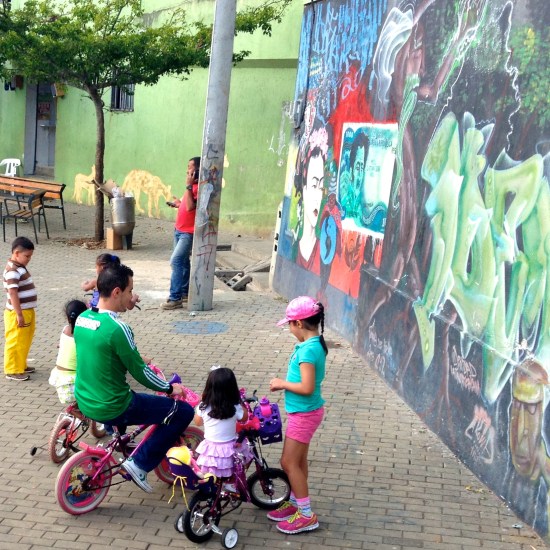 Children play in formally cartel-dominated areas