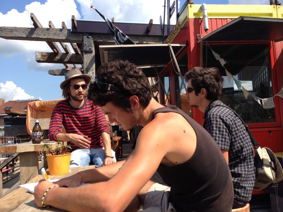 Informal meeting at "De Ceuvel" - one of Amsterdam's latest and funkiest new restaurants made of recycled materials serving local food. But sustainability is also about style: the music is good, the location is great (on the water) and the beers are cold. 